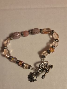 Pink Glass Beaded Bracelet with Sun Charm